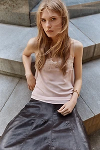 Jupe corolle en tissu enduit