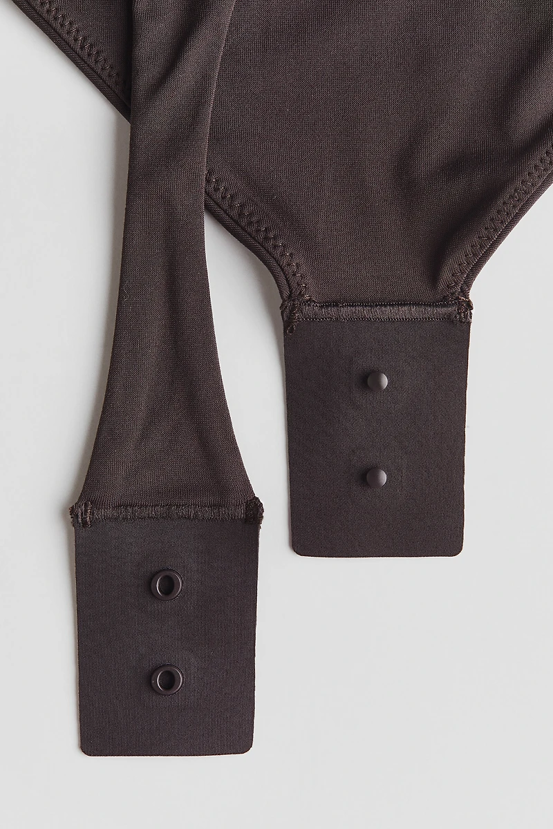 Maillot Tanga moulant à manches courtes