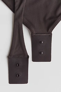 Maillot Tanga moulant à manches courtes