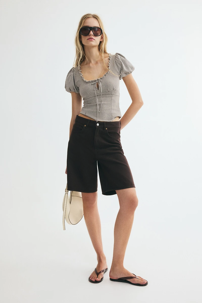 Blouse à manches bouffantes avec liens nouer