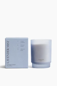 Bougie parfumée dans un pot en verre dépoli