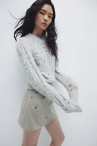 Chandail en tricot pointelle