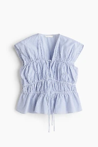 Blouse en popeline avec cordons de serrage