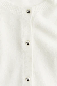Gilet à manches courtes en fin tricot