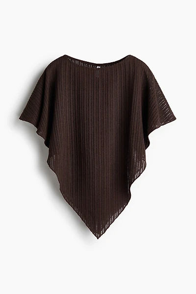 Cape en tricot côtelé