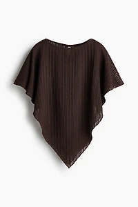 Cape en tricot côtelé