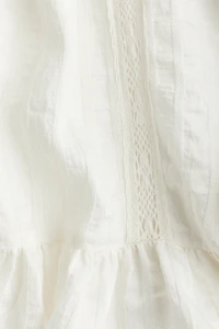 Blouse à manches bouffantes