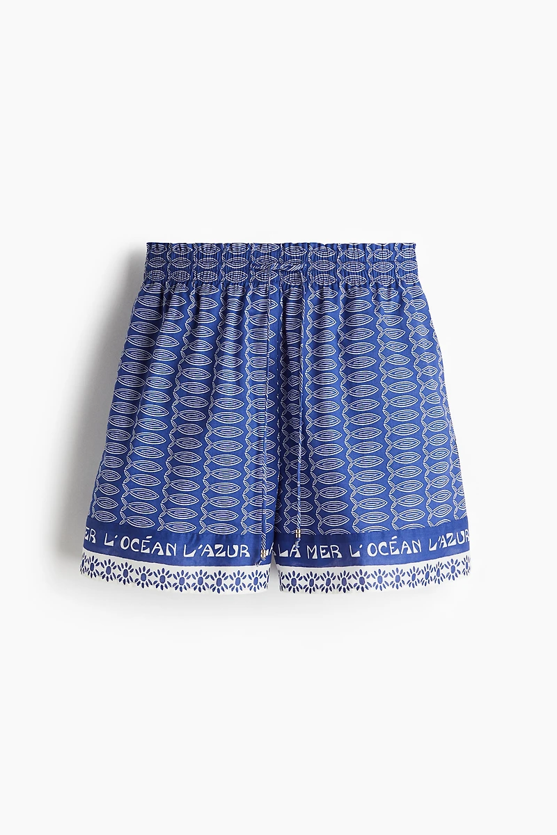 Short imprimé avec cordon de serrage