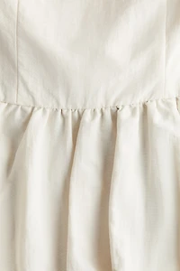 Robe bustier avec basque