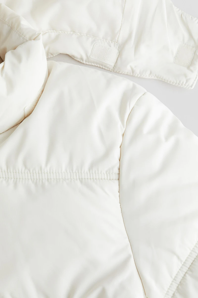 Veste matelassée à capuchon