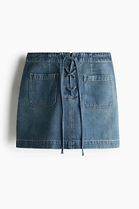 Minijupe en denim avec laçage
