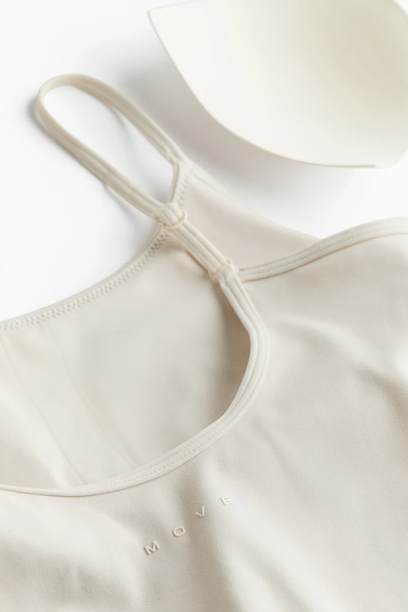 Haut de sport à soutien-gorge intégré SoftMove🅪