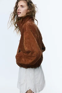 Veste grande taille en cuir velours fendu