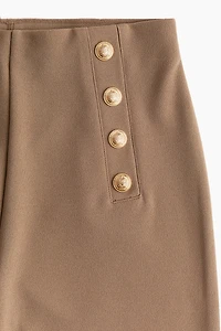 Pantalon à boutons