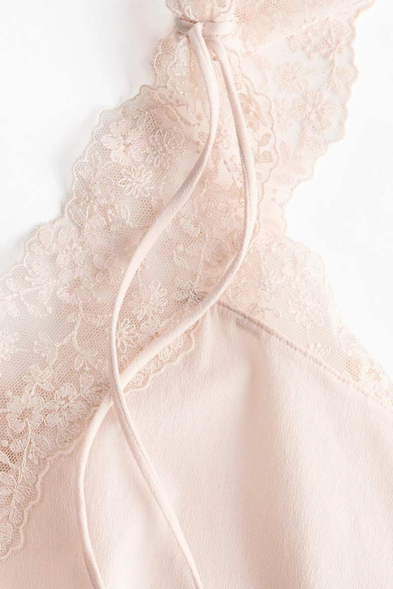 Haut à bretelles brodées