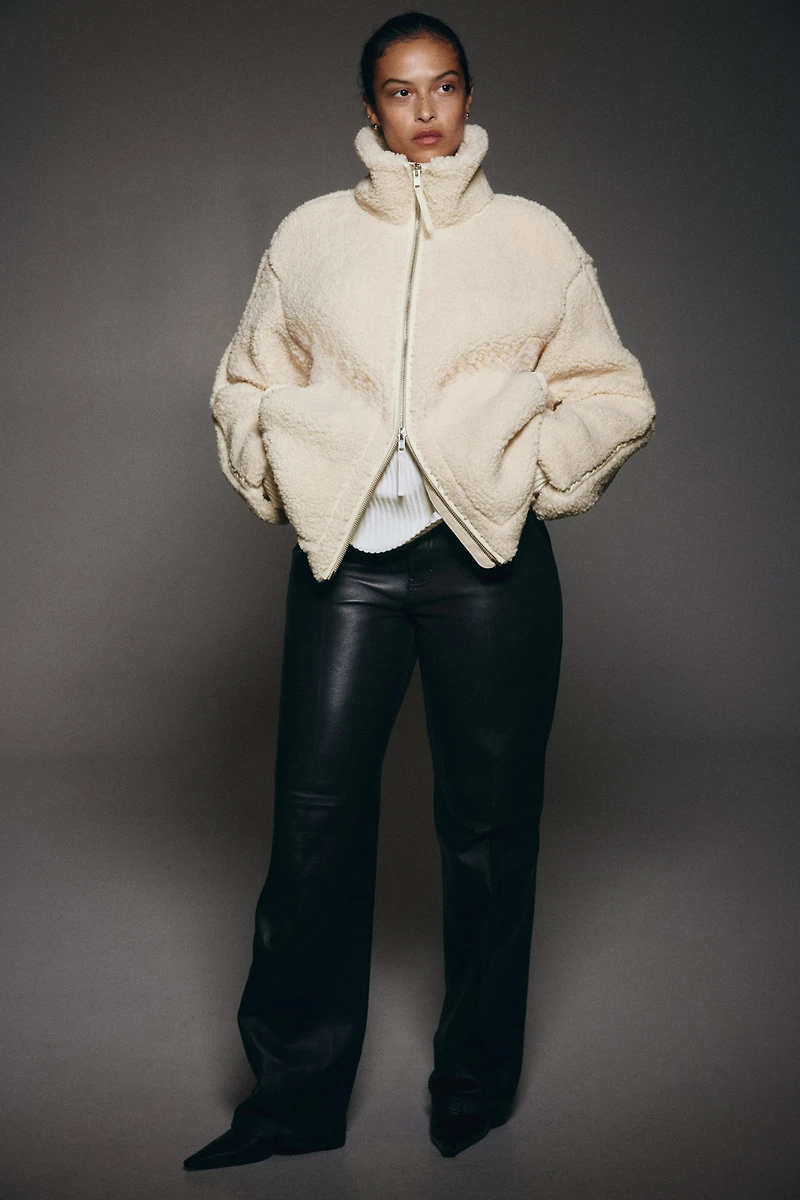 Veste flottante en tissu peluche