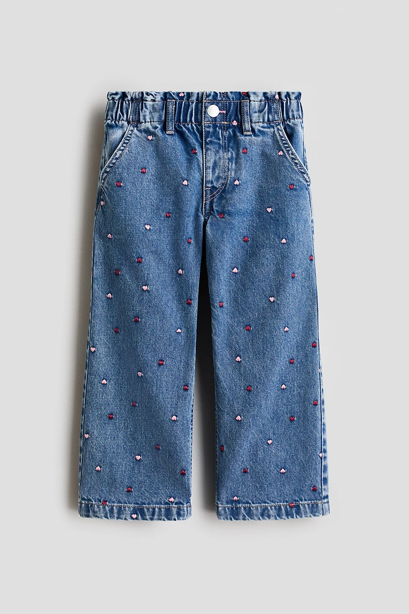 Jean jambes larges sur taille élastique