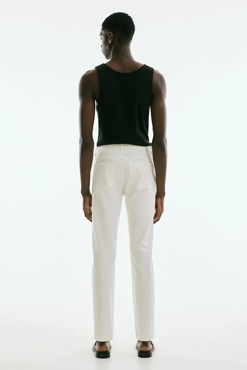 Pantalon aminci en tissu croisé de coton