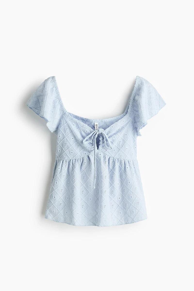 Blouse en jersey pointelle