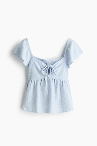 Blouse en jersey pointelle