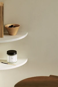 Bougie parfumée dans un pot en verre