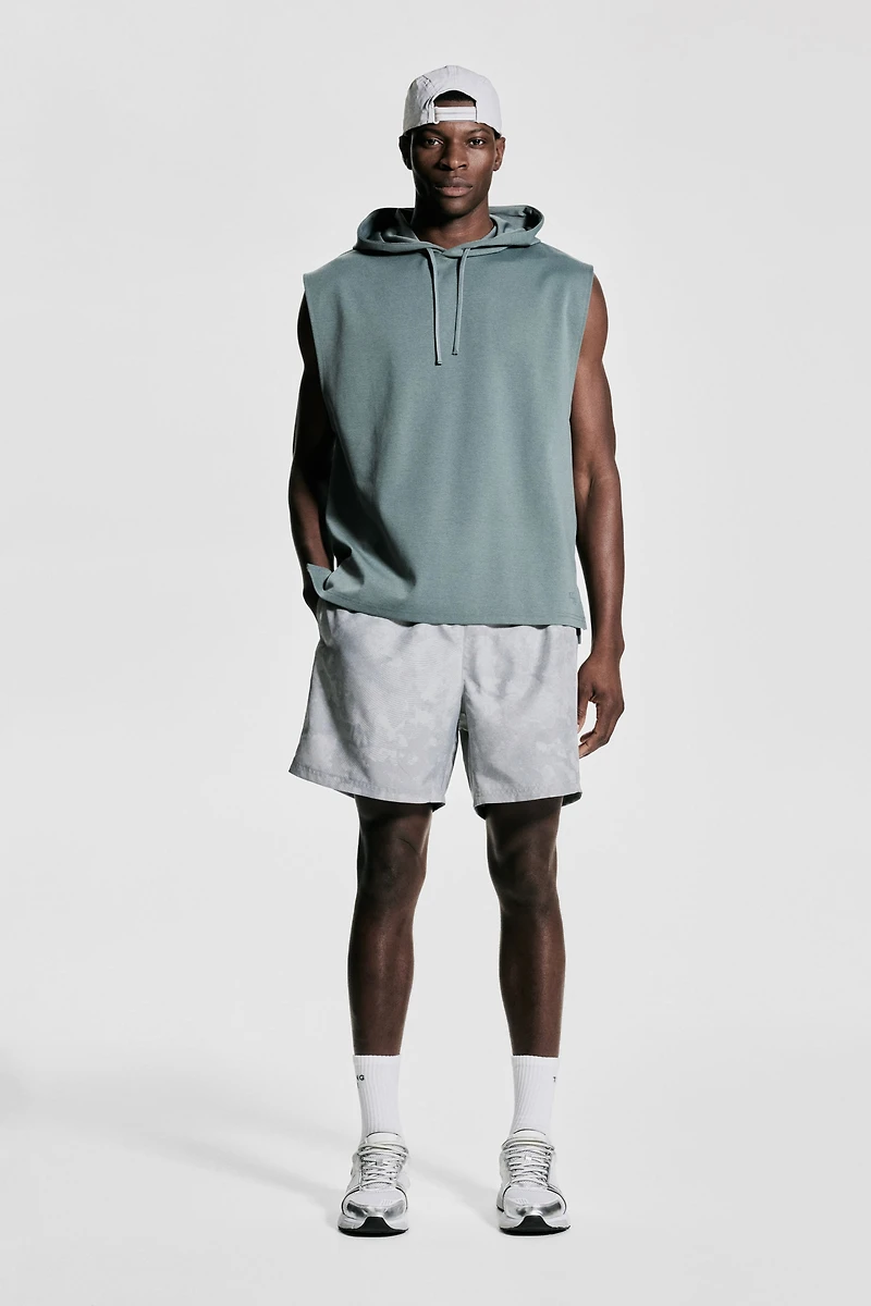 Mid-Length Sports Shorts with DryMove™