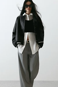 Coated bomber jacket