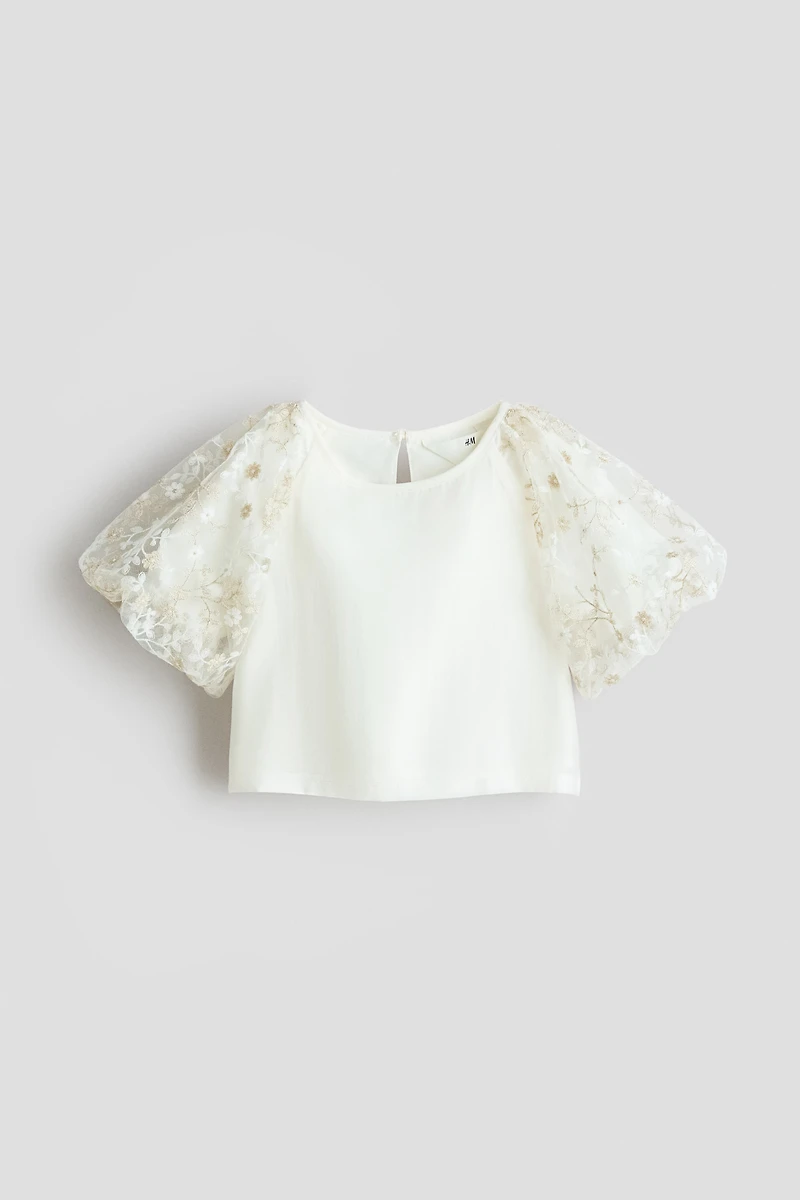 Blouse à manches bouffantes