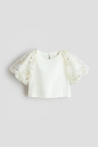 Blouse à manches bouffantes