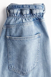 Jean large à ceinture plissée
