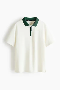 Polo de sport classique à col fermeture éclair