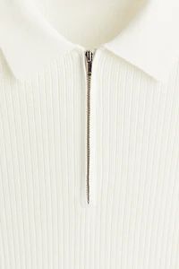 Polo près du corps avec col à fermeture éclair