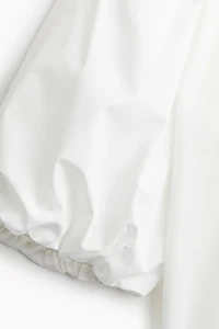 Blouse à manches bouffantes