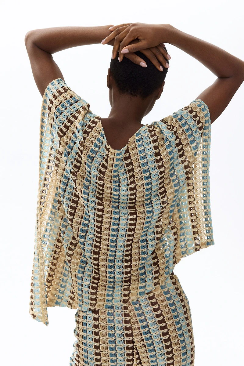 Asymmetric Cape Top