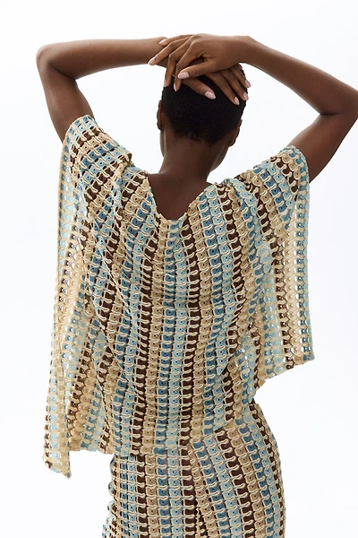 Asymmetric Cape Top