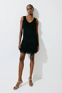 Robe en tricot avec franges