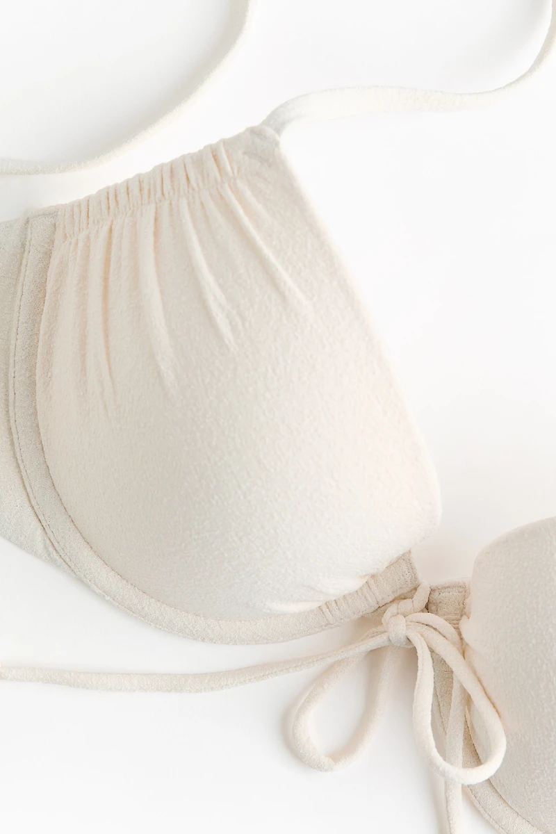 Haut de maillot pigeonnant