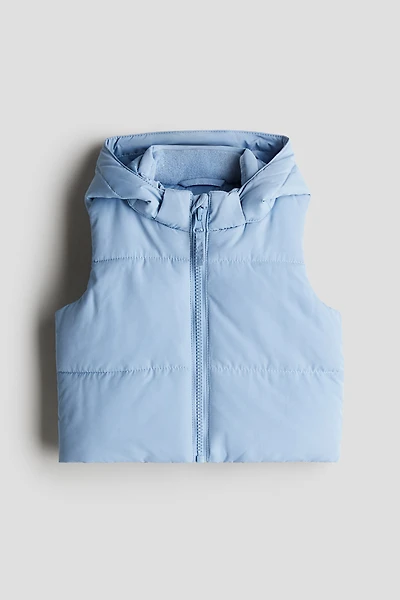 Gilet matelassé sans manches avec capuche