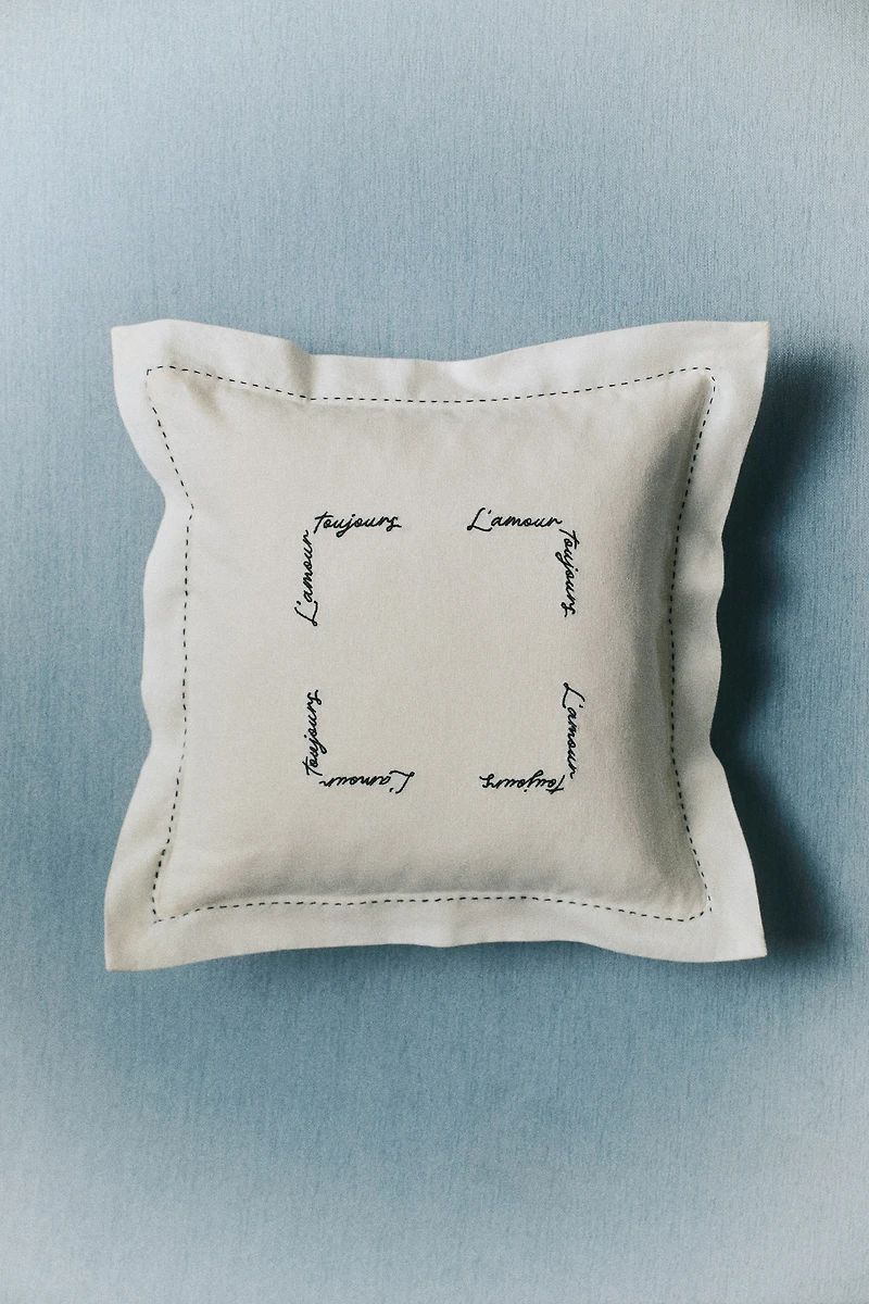 Housse de coussin en lin mélangé avec détail brodé