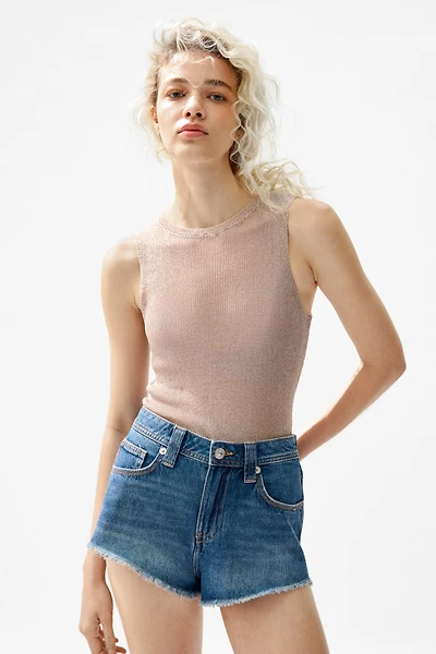 Short frangé en denim