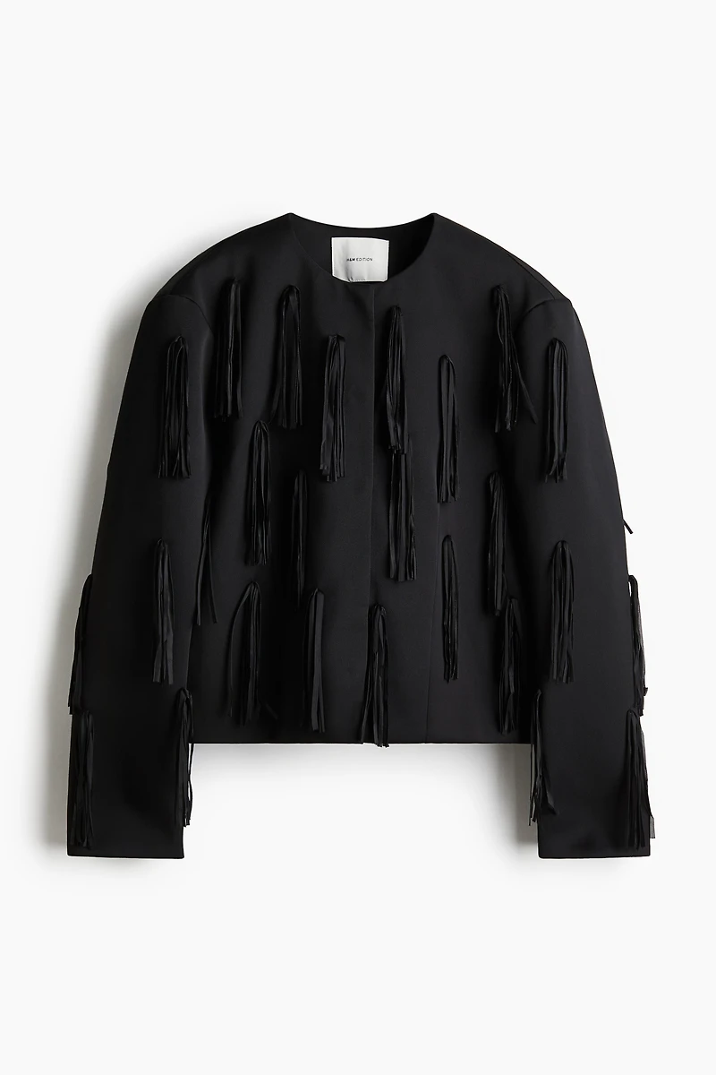 Veste frangée