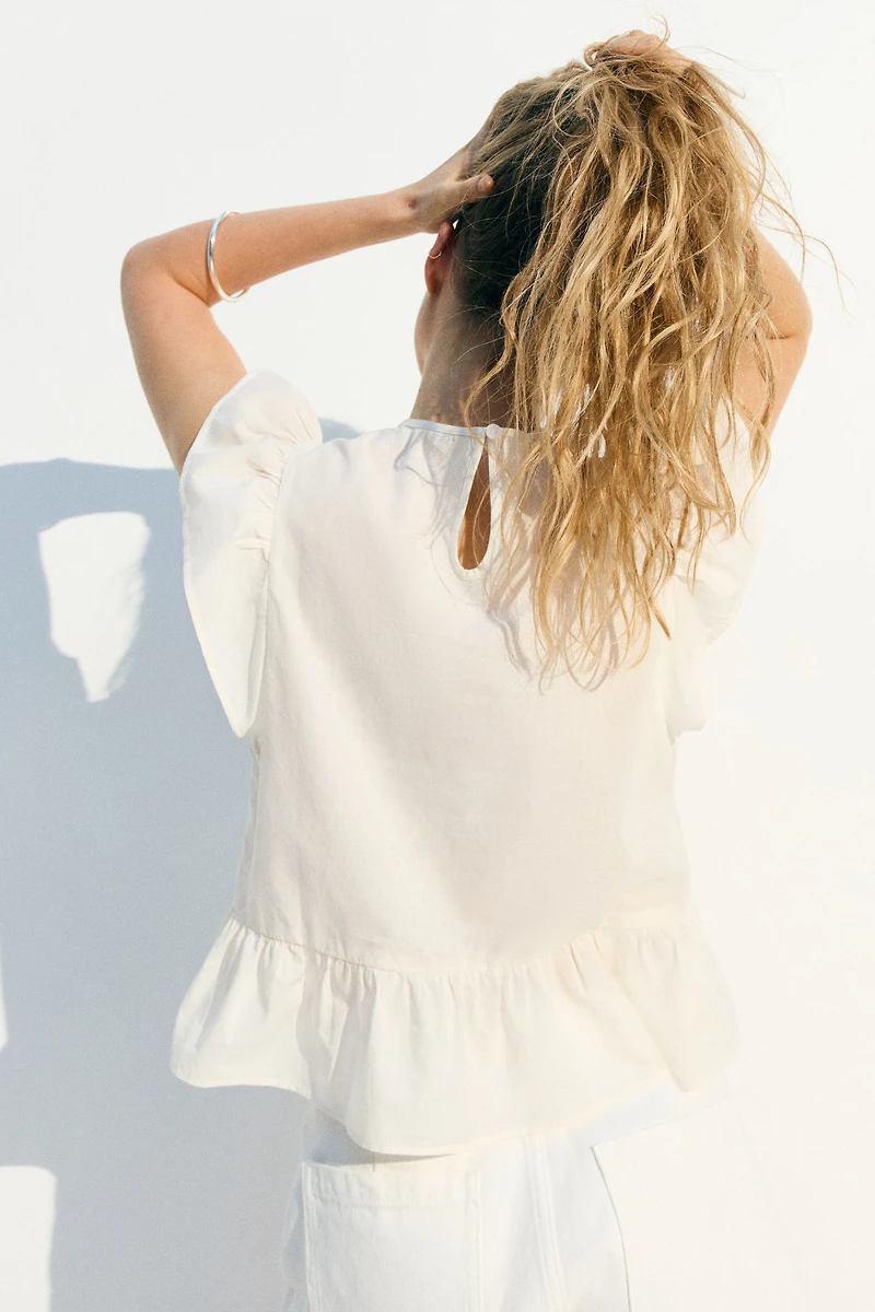Lace-Inset Peplum Blouse
