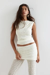 Pantalon en dentelle avec jupe superposée