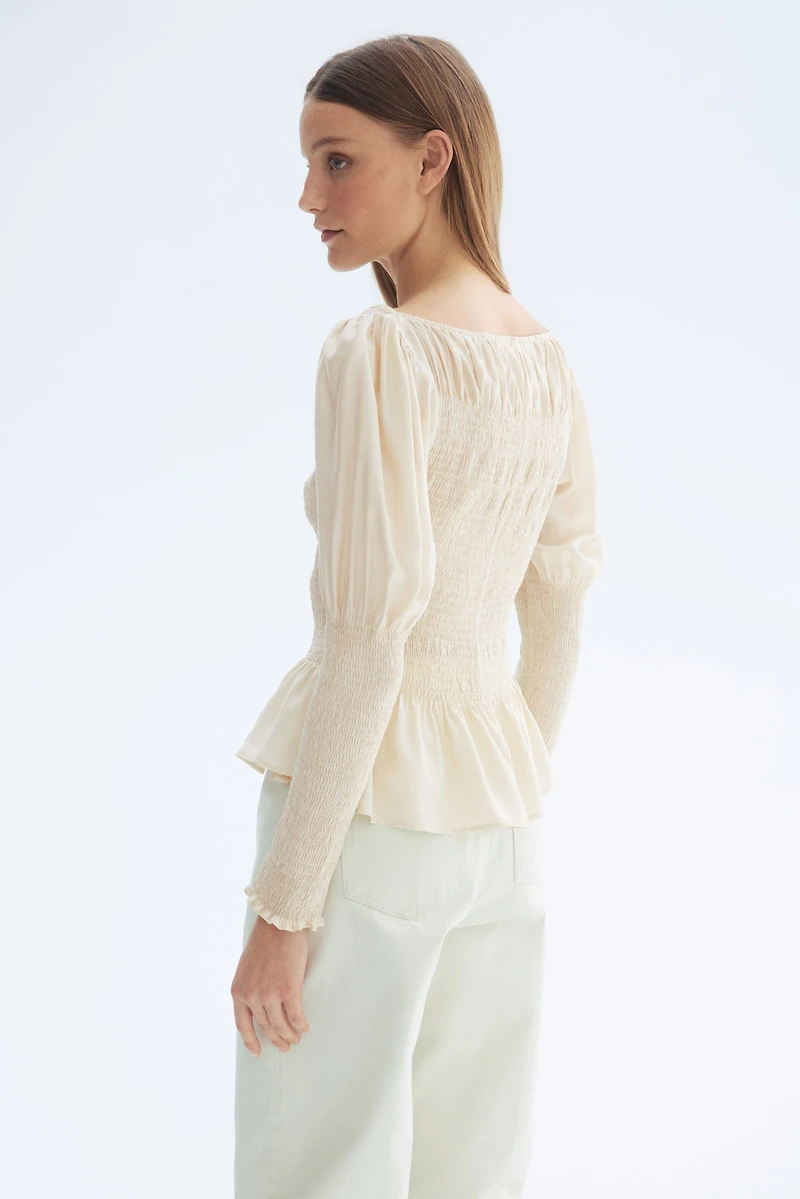 Blouse smockée en viscose mélangée