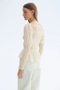 Blouse smockée en viscose mélangée