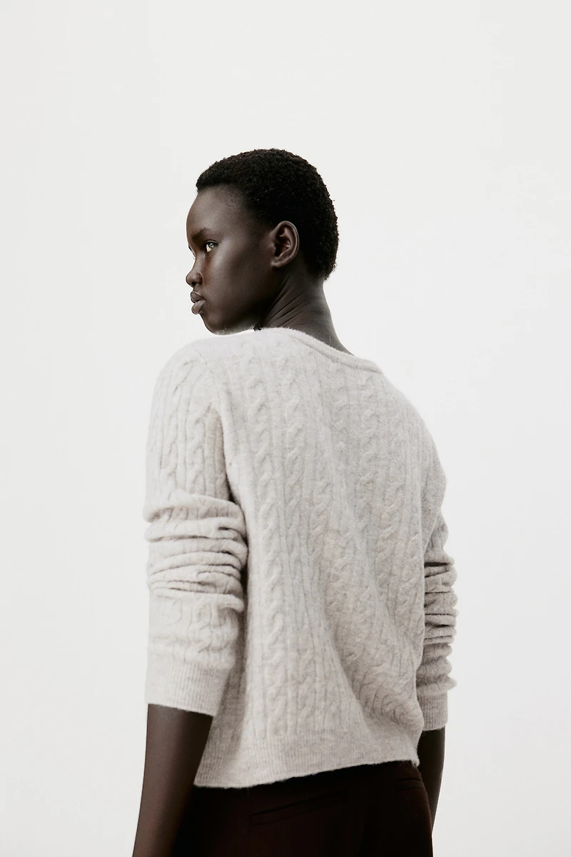 Gilet en tricot torsadé