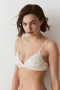 Soutien-gorge souple et coussiné en pointelle