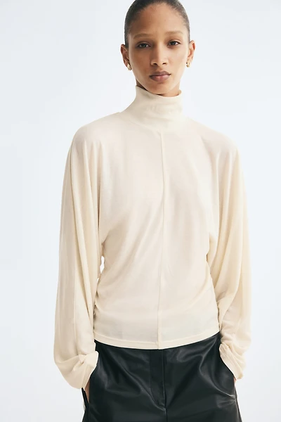 Batwing-Sleeved Mock Turtleneck Top