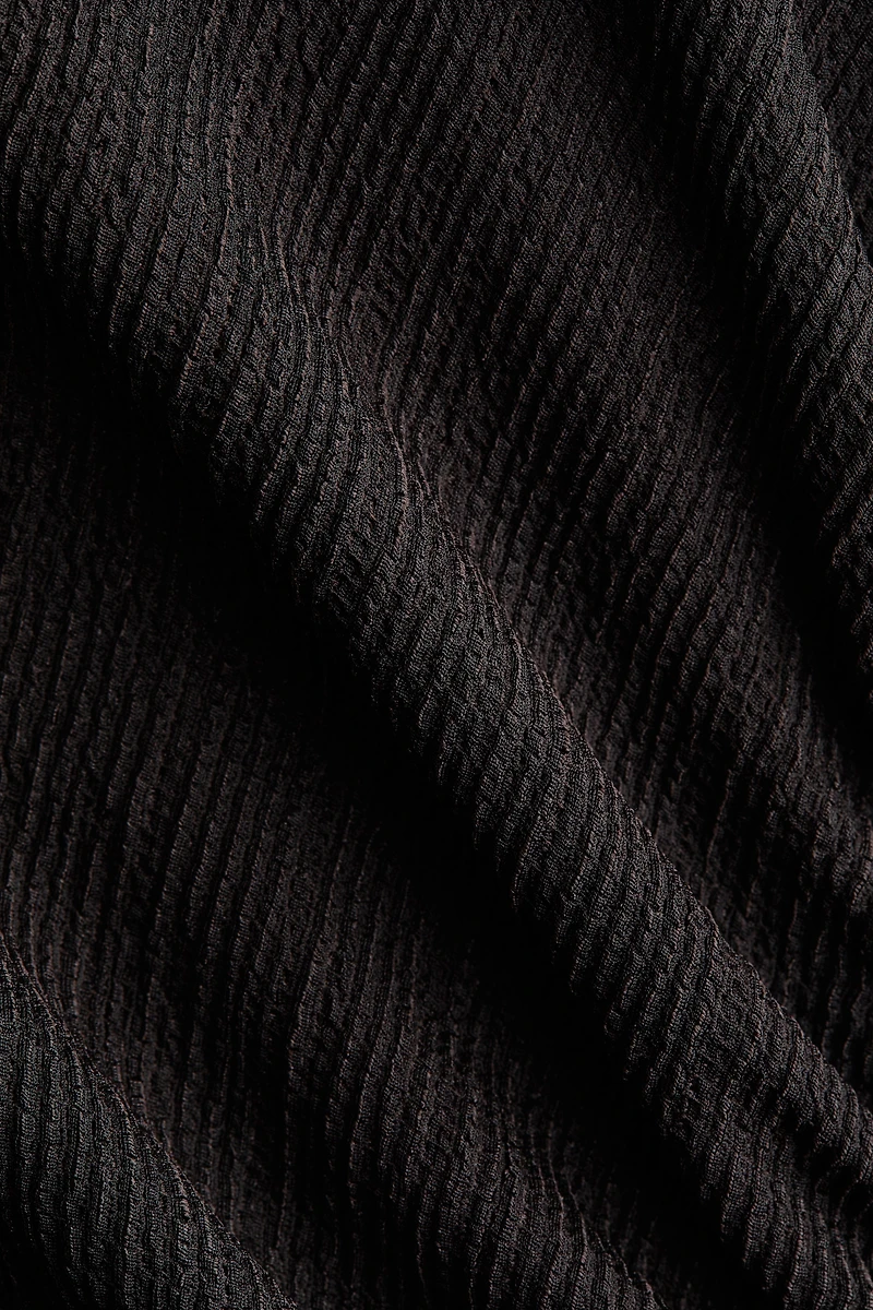 Robe à manches trompette en jersey