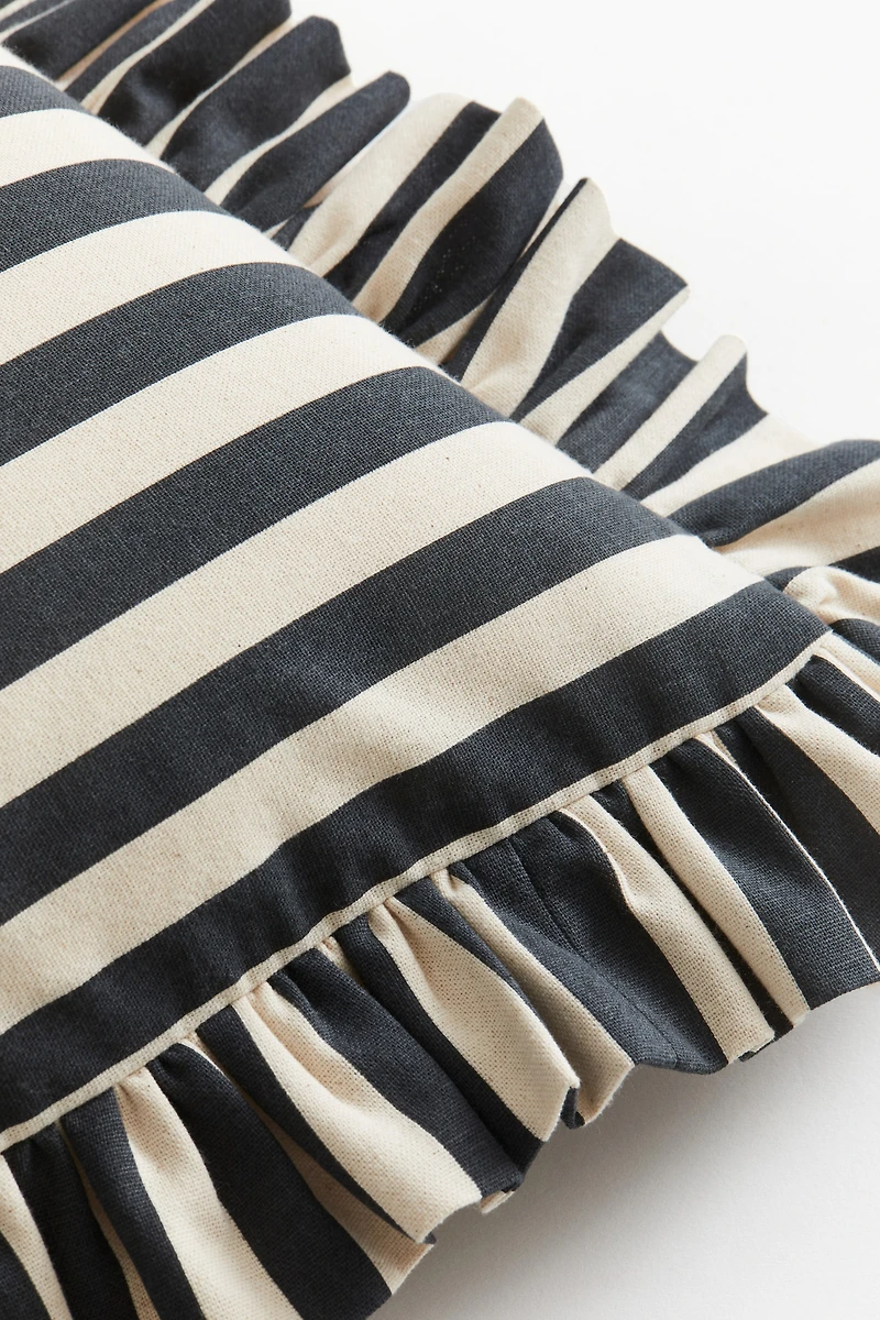 Housse de coussin volantée en coton